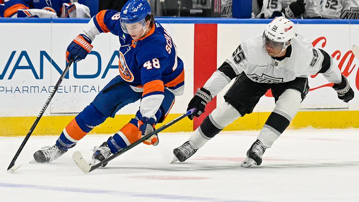 Mar 13, 2026; Elmont, New York, USA; New York Islanders defenseman Matthew Schaefer (48) skates with the puck defended by Los Angeles Kings right wing Quinton Byfield (55) during the first period at UBS Arena. Mandatory Credit: Dennis Schneidler-Imagn Images Mar 13, 2026; Elmont, New York, USA; New York Islanders defenseman Matthew Schaefer (48) skates with the puck defended by Los Angeles Kings right wing Quinton Byfield (55) during the first period at UBS Arena. Mandatory Credit: Dennis Schneidler-Imagn Images