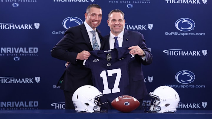 Dec 8, 2025; University Park, PA, USA; Matt Campbell, left,  and Penn State University athletic director Pat Kraft, right, pose for a photo after Matt Campbell is announced as the Penn State Nittany Lions new head coach during a press conference at the Beaver Stadium Press Room. Mandatory Credit: Matthew O'Haren-Imagn Images