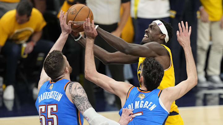 Jun 13, 2025; Indianapolis, Indiana, USA; Indiana Pacers forward Pascal Siakam (43) drives to the hoop past Oklahoma City Thunder center Isaiah Hartenstein (55) and forward Chet Holmgren (7) during the third quarter of game four of the 2025 NBA Finals at Gainbridge Fieldhouse. Mandatory Credit: Kyle Terada-Imagn Images