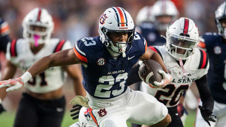 Auburn Tigers running back Jeremiah Cobb (23) breaks free for a touchdown as Auburn Tigers take on Ball State Cardinals at Jordan-Hare Stadium in Auburn, Ala. on Saturday, Sept. 6, 2025. Auburn Tigers running back Jeremiah Cobb (23) breaks free for a touchdown as Auburn Tigers take on Ball State Cardinals at Jordan-Hare Stadium in Auburn, Ala. on Saturday, Sept. 6, 2025.