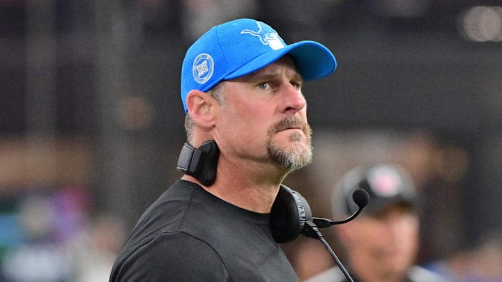 Detroit Lions coach Dan Campbell stands on the sidelines.