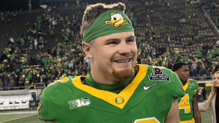 Oregon’s Bryce Boettcher celebrates the Ducks' victory over James Madison at the end of the game at Autzen Stadium in Eugene Dec. 20, 2025.