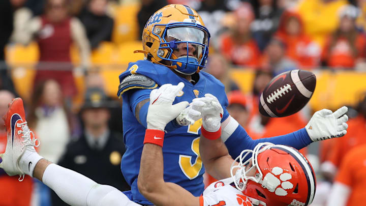 Nov 16, 2024; Pittsburgh, Pennsylvania, USA; Pittsburgh Panthers defensive back Donovan McMillon (3) breaks up a pass intended for Clemson Tigers wide receiver Troy Stellato (10) during the third quarter at Acrisure Stadium. Mandatory Credit: Charles LeClaire-Imagn Images Nov 16, 2024; Pittsburgh, Pennsylvania, USA; Pittsburgh Panthers defensive back Donovan McMillon (3) breaks up a pass intended for Clemson Tigers wide receiver Troy Stellato (10) during the third quarter at Acrisure Stadium. Mandatory Credit: Charles LeClaire-Imagn Images