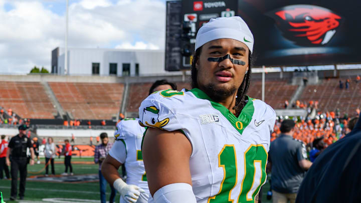 Sep 14, 2024; Corvallis, Oregon, USA; Oregon Ducks offensive lineman Iapani Laloulu (72) and Oregon Ducks defensive end Matayo Uiagalelei (10) leave the field after the game against the Oregon State Beavers at Reser Stadium. Mandatory Credit: Craig Strobeck-Imagn Images