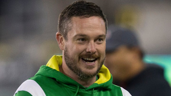 Oregon coach Dan Lanning joins his team during warmups before their game against Utah in final home game of season at Autzen Stadium.

Ncaa Football Oregon Utah Football Utah At Oregon
