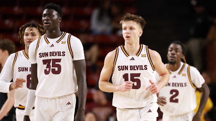 Jan 3, 2026; Tempe, Arizona, USA; Arizona State Sun Devils center Massamba Diop (35) and guard Noah Meeusen (15) against the Colorado Buffaloes at Desert Financial Arena. Mandatory Credit: Mark J. Rebilas-Imagn Images