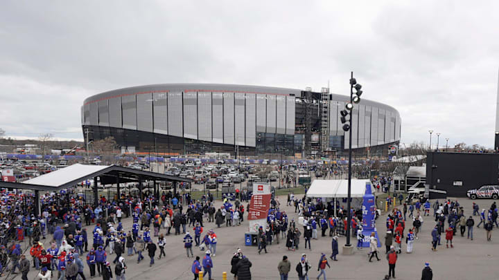Fans enter Highmark Stadium before the start of the Bills home game against the Tampa Bay Buccaneers on Nov 16, 2025 in Orchard Park. In the background is the new stadium.