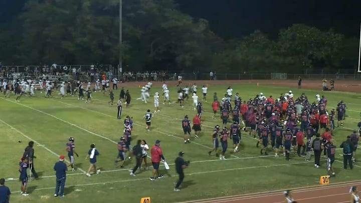Bishop Montgomery (in the white) had numerous players leave the sidelines against Saint Louis High in Hawaii, which resulted in massive suspensions.