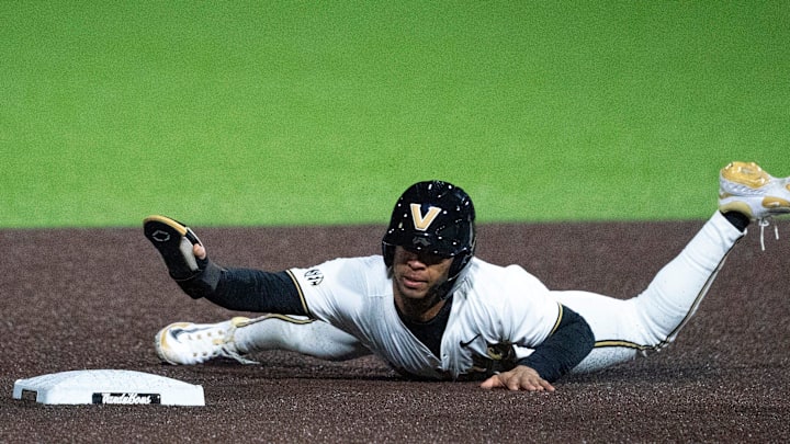 Vanderbilt Commodores RJ Hamilton (2) slides safely into second base for a steal against the Air Force Falcons at Hawkins Field in Nashville, Tenn., Monday, Feb. 17, 2025. The Commodores beat the Falcons 3-1.