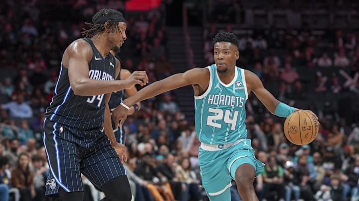 Charlotte Hornets forward Brandon Miller (24) on the drive against Orlando Magic center Wendell Carter Jr. (34).