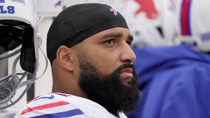 Buffalo Bills defensive tackle DaQuan Jones takes a seat while the offensive line is on the field during first half action against the Tampa Bay Buccaneers on Nov 16, 2025 at Highmark Stadium in Orchard Park.