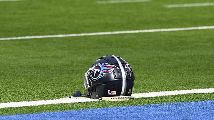 Nov 10, 2024; Inglewood, California, USA; A Tennessee Titans helmet on the turf during pregame warmups before an NFL game against the Los Angeles Chargers at SoFi Stadium. Mandatory Credit: Robert Hanashiro-Imagn Images