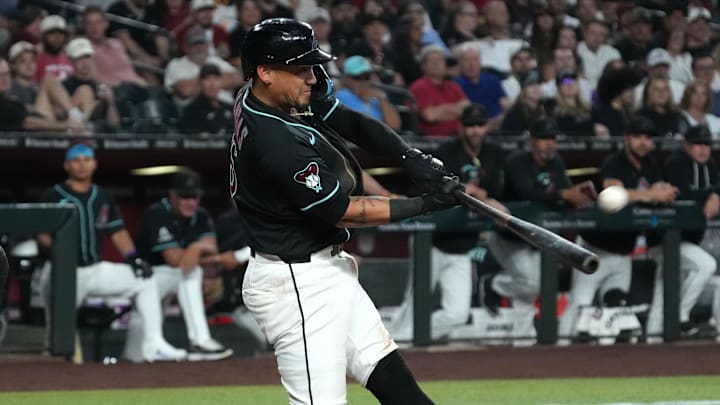 Apr 22, 2026; Phoenix, Arizona, USA; Arizona Diamondbacks second baseman Ildemaro Vargas (6) hits a three run home run against the Chicago White Sox in the second inning at Chase Field. Mandatory Credit: Rick Scuteri-Imagn Images