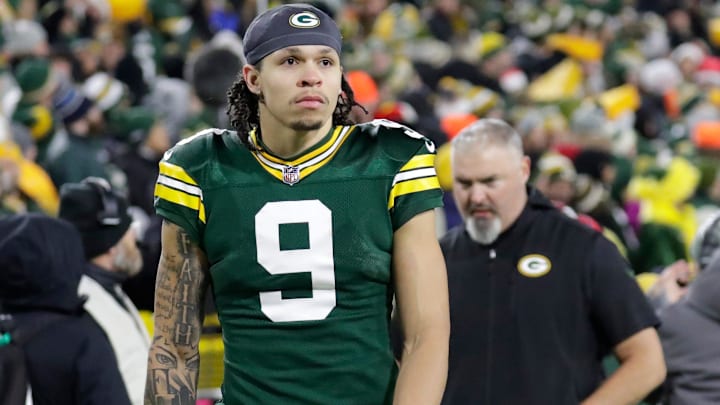 Green Bay Packers wide receiver Christian Watson (9) leaves the field in the fourth quarter at Lambeau Field.