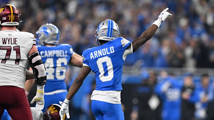 Detroit Lions corner back Terrion Arnold (0) celebrates after a fourth down stop against the Washington Commanders 