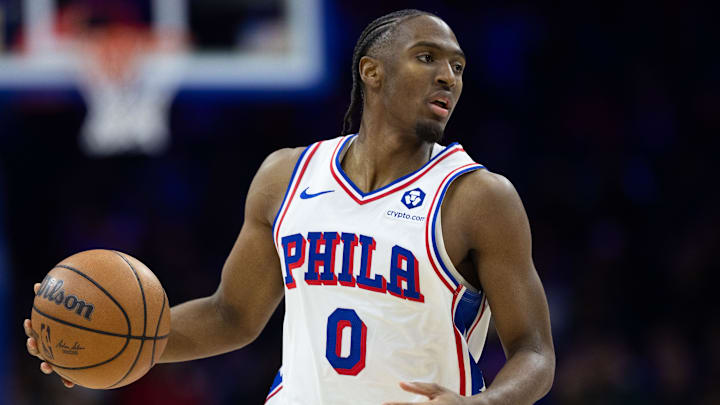 Jan 15, 2025; Philadelphia, Pennsylvania, USA; Philadelphia 76ers guard Tyrese Maxey (0) controls the ball against the New York Knicks during the third quarter at Wells Fargo Center. Mandatory Credit: Bill Streicher-Imagn Images