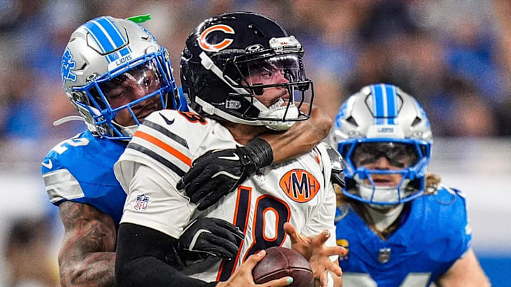 Detroit Lions safety Brian Branch (32) sacks Chicago Bears quarterback Caleb Williams (18) 