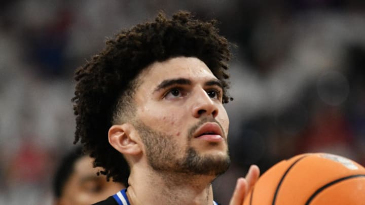 Mar 2, 2026; Raleigh, North Carolina, USA;  Duke Blue Devils forward Cameron Boozer (12) shoots a free throw during the second half against the NC State Wolfpack at Lenovo Center. Mandatory Credit: Zachary Taft-Imagn Images