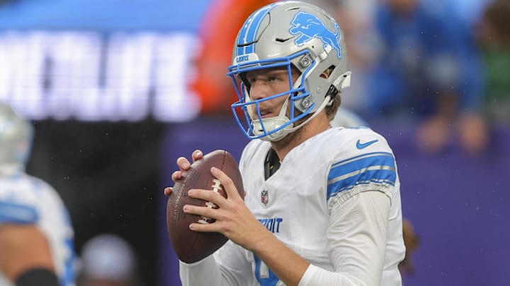 Former Detroit Lions quarterback Nate Sudfeld (8) takes a snap during warmups prior to his preseason game against the New York Giants at MetLife Stadium.