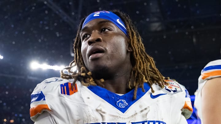 Boise State running back Ashton Jeanty walks off the field after a game.
