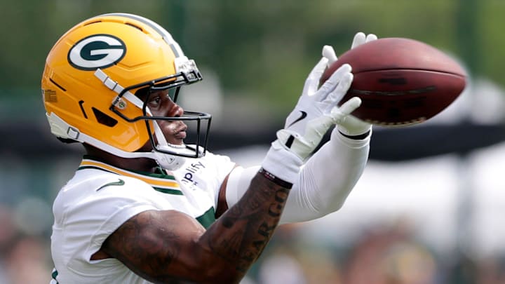 Green Bay Packers running back MarShawn Lloyd (32) participates in drills during the third day of training camp on July 25.