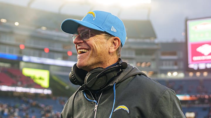 Dec 28, 2024; Foxborough, Massachusetts, USA; Los Angeles Chargers head coach Jim Harbaugh reacts after defeating the New England Patriots at Gillette Stadium. Mandatory Credit: David Butler II-Imagn Images Dec 28, 2024; Foxborough, Massachusetts, USA; Los Angeles Chargers head coach Jim Harbaugh reacts after defeating the New England Patriots at Gillette Stadium. Mandatory Credit: David Butler II-Imagn Images
