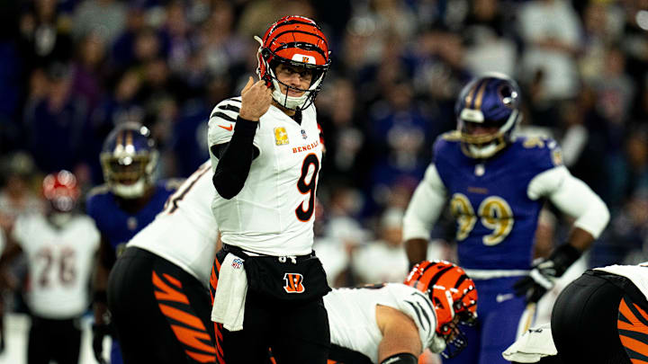 Cincinnati Bengals quarterback Joe Burrow (9) communicates with his team in the first quarter of the NFL game against the Baltimore Ravens at M&T Banks Stadium in Baltimore on Thursday, Nov. 7, 2024.
