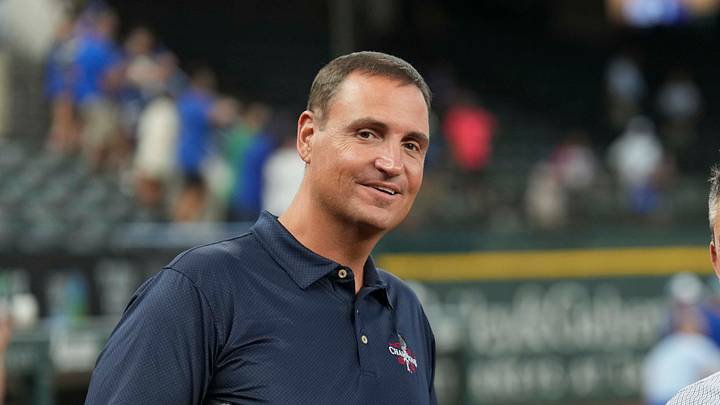 Jun 21, 2024; Arlington, Texas, USA; Texas Rangers general manager Chris Young (left) and Kansas City Royals general manager J.J. Picollo (right) talk before the game against the Kansas City Royals at Globe Life Field. Mandatory Credit: Jim Cowsert-USA TODAY Sports