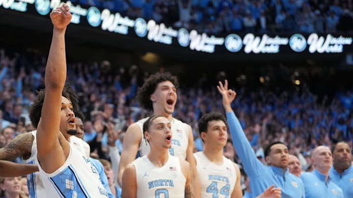 Feb 7, 2026; Chapel Hill, North Carolina, USA; North Carolina Tar Heels guard Seth Trimble (7) and bench react after hitting the game winning shot in the second half at Dean E. Smith Center. Mandatory Credit: Bob Donnan-Imagn Images