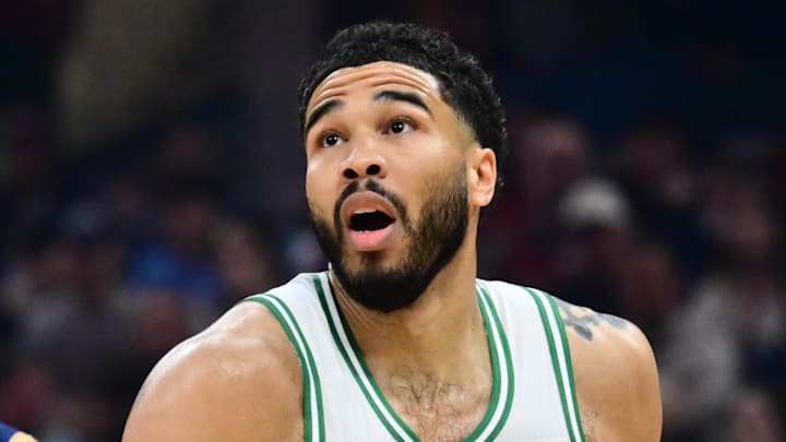 Mar 8, 2026; Cleveland, Ohio, USA; Boston Celtics forward Jayson Tatum (0) drives to the basket against Cleveland Cavaliers guard Jaylon Tyson (20) during the first half at Rocket Arena. Mandatory Credit: Ken Blaze-Imagn Images