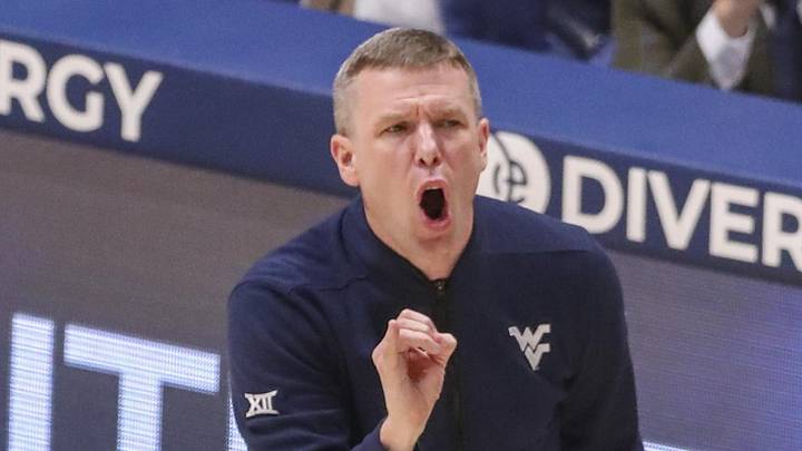 Mar 6, 2026; Morgantown, West Virginia, USA; West Virginia Mountaineers head coach Ross Hodge yells from the sideline during the first half against the UCF Knights at Hope Coliseum. Mandatory Credit: Ben Queen-Imagn Images