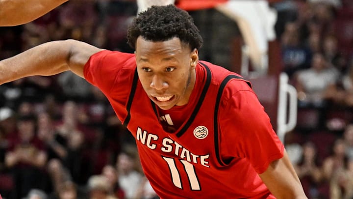 Jan 10, 2026; Tallahassee, Florida, USA; North Carolina State Wolfpack guard Quadir Copeland (11) drives to the net past Florida State Seminoles guard Martin Somerville (1) during the second half at Donald L. Tucker Center. Mandatory Credit: Melina Myers-Imagn Images Jan 10, 2026; Tallahassee, Florida, USA; North Carolina State Wolfpack guard Quadir Copeland (11) drives to the net past Florida State Seminoles guard Martin Somerville (1) during the second half at Donald L. Tucker Center. Mandatory Credit: Melina Myers-Imagn Images
