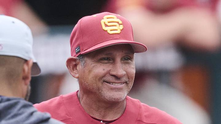 May 31, 2025; Corvallis, OR, USA; USC head coach Andy Stankiewicz visits with official before a game against Saint Mary's at the NCAA Corvallis Regional at Goss Stadium. Mandatory Credit: Troy Wayrynen-Imagn Images