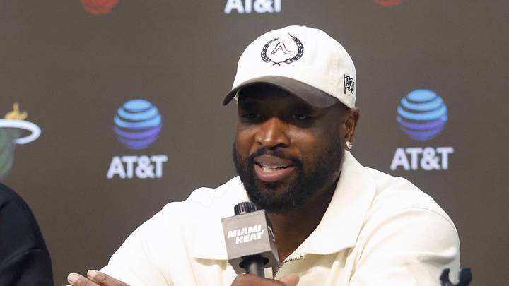 Former Miami Heat players Dwyane Wade (R) and Shaquille O'Neal (L) talk about their winning the NBA finals