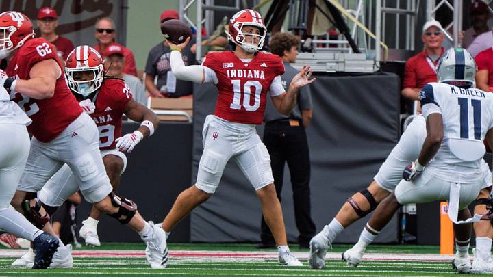 Indiana's Josh Hoover (10) passes during the Indiana versus Howard football game at Memorial Stadium on Saturday, Sept. 12, 2026. Indiana's Josh Hoover (10) passes during the Indiana versus Howard football game at Memorial Stadium on Saturday, Sept. 12, 2026.