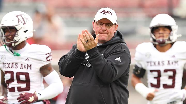 Oct 18, 2025; Fayetteville, Arkansas, USA; Texas A&M Aggies head coach Mike Elko prior to the game against the Arkansas Razorbacks at Donald W. Reynolds Razorback Stadium. Mandatory Credit: Nelson Chenault-Imagn Images Oct 18, 2025; Fayetteville, Arkansas, USA; Texas A&M Aggies head coach Mike Elko prior to the game against the Arkansas Razorbacks at Donald W. Reynolds Razorback Stadium. Mandatory Credit: Nelson Chenault-Imagn Images
