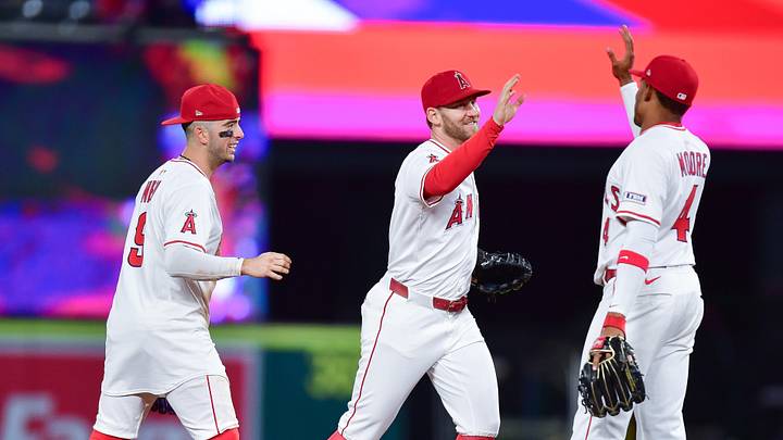 Angels shortstop Zach Neto (9) left fielder Taylor Ward (3) and second baseman Christian Moore (4) celebrate the victory against the Boston Red Sox at Angel Stadium on June 23, 2025. Angels shortstop Zach Neto (9) left fielder Taylor Ward (3) and second baseman Christian Moore (4) celebrate the victory against the Boston Red Sox at Angel Stadium on June 23, 2025.
