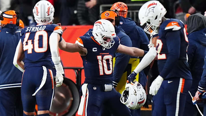 Dec 2, 2024; Denver, Colorado, USA; Denver Broncos quarterback Bo Nix (10) dances on the sidelines following his touchdown pass in the third quarter against the Cleveland Browns at Empower Field at Mile High. 
