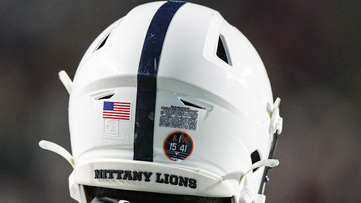 Nov 19, 2022; Piscataway, New Jersey, USA; A Penn State Nittany Lions helmet is seen with a sticker honoring the Virginia football players who were victims of a shooting on the University of Virginia campus, on November thirteenth 2022, during the second half against the Rutgers Scarlet Knights at SHI Stadium. 