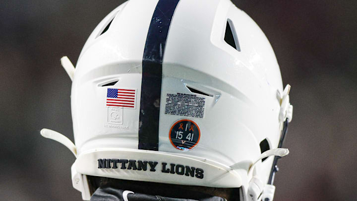 Nov 19, 2022; Piscataway, New Jersey, USA; A Penn State Nittany Lions helmet is seen with a sticker honoring the Virginia football players who were victims of a shooting on the University of Virginia campus, on November thirteenth 2022, during the second half against the Rutgers Scarlet Knights at SHI Stadium. 