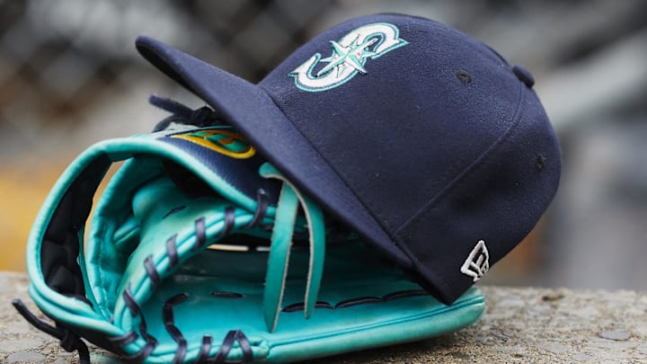 May 12, 2018; Detroit, MI, USA; Hat and glove of Seattle Mariners center fielder Dee Gordon (9) sits in dugout during the third inning against the Detroit Tigers at Comerica Park. May 12, 2018; Detroit, MI, USA; Hat and glove of Seattle Mariners center fielder Dee Gordon (9) sits in dugout during the third inning against the Detroit Tigers at Comerica Park.