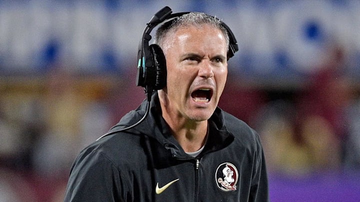 Sep 3, 2023; Orlando, Florida, USA; Florida State Seminoles head coach Mike Norvell is excited during the fourth quarter against the Louisiana State Tigers at Camping World Stadium. Mandatory Credit: Melina Myers-Imagn Images