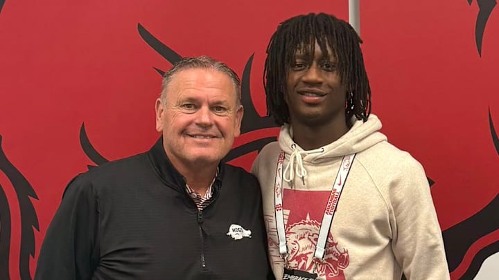 Arkansas Razorbacks coach Sam Pittman with Rejoice Christian School (Owasso, Oklahoma) 2028 athlete Kamieon Compton-Nero during his unofficial visit in February.