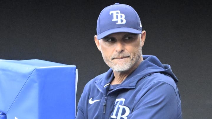 Aug 26, 2025; Cleveland, Ohio, USA; Tampa Bay Rays manager Kevin Cash (16) stands in the dugout in the first inning against the Cleveland Guardians at Progressive Field. 