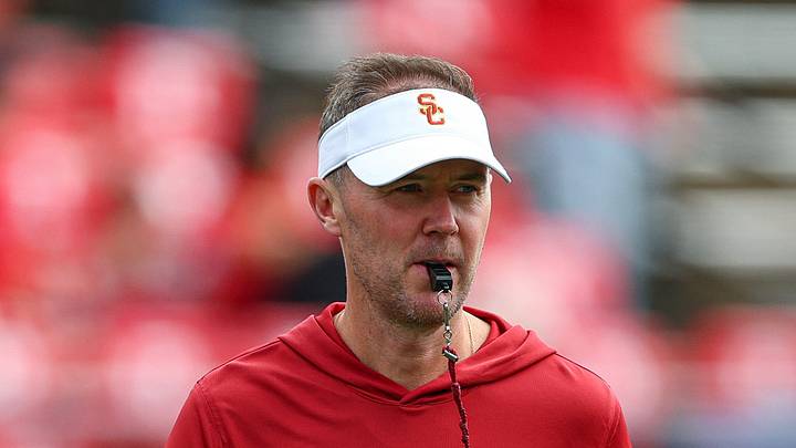 Sep 19, 2026; Piscataway, New Jersey, USA; USC Trojans head coach Lincoln Riley on the field during warm ups before the game against the Rutgers Scarlet Knights at SHI Stadium. Mandatory Credit: Vincent Carchietta-Imagn Images Sep 19, 2026; Piscataway, New Jersey, USA; USC Trojans head coach Lincoln Riley on the field during warm ups before the game against the Rutgers Scarlet Knights at SHI Stadium. Mandatory Credit: Vincent Carchietta-Imagn Images