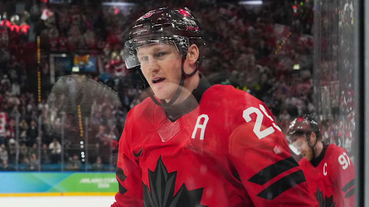 Feb 20, 2026; Milan, Italy; Nathan MacKinnon (29) of Canada celebrates after scoring a goal during the third period against Finland in a men's ice hockey semifinal during the Milano Cortina 2026 Olympic Winter Games at Milano Santagiulia Ice Hockey Arena. Mandatory Credit: James Lang-Imagn Images