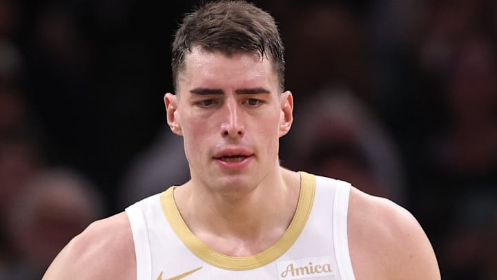 Apr 12, 2026; Boston, Massachusetts, USA; Boston Celtics forward Luka Garza (52) celebrates with Boston Celtics guard John Tonje (8) during the first half at TD Garden. Mandatory Credit: Paul Rutherford-Imagn Images Apr 12, 2026; Boston, Massachusetts, USA; Boston Celtics forward Luka Garza (52) celebrates with Boston Celtics guard John Tonje (8) during the first half at TD Garden. Mandatory Credit: Paul Rutherford-Imagn Images