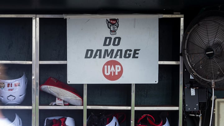 Jun 17, 2024; Omaha, NE, USA; NC State Wolfpack shortstop Brandon Butterworth (3) walks through the dugout before the game against the Florida Gators at Charles Schwab Field Omaha. Mandatory Credit: Dylan Widger-Imagn Images Jun 17, 2024; Omaha, NE, USA; NC State Wolfpack shortstop Brandon Butterworth (3) walks through the dugout before the game against the Florida Gators at Charles Schwab Field Omaha. Mandatory Credit: Dylan Widger-Imagn Images