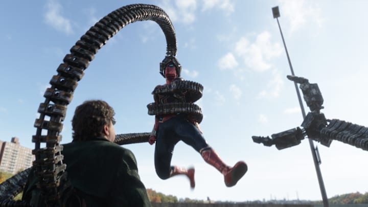 Doc Ock (Alfred Molina) and Spider-Man battle it out in Columbia Pictures' SPIDER-MAN: NO WAY HOME. Courtesy of Sony Pictures. ©2021 CTMG. All Rights Reserved. MARVEL and all related character names: © & ™ 2021 MARVEL