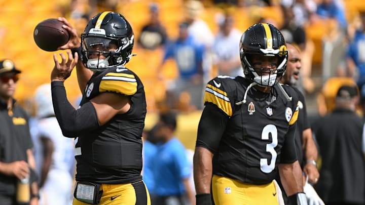 Pittsburgh Steelers quarterbacks Justin Fields and Russell Wilson warm up for a game.